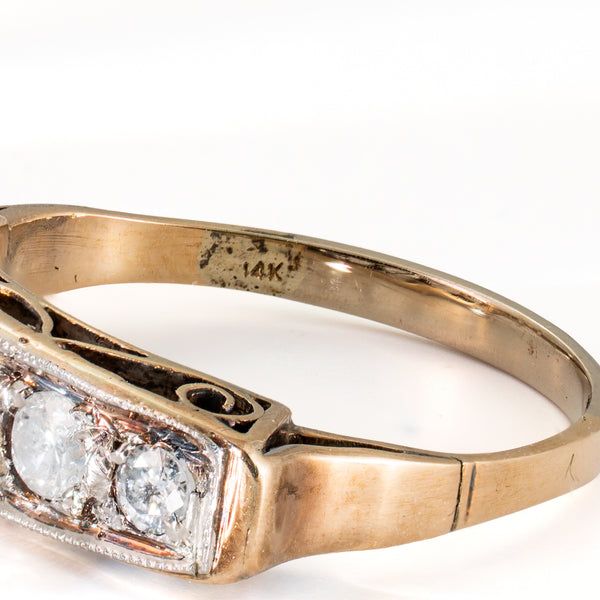 Interior of an antique diamond ring displaying the original 14K hallmark