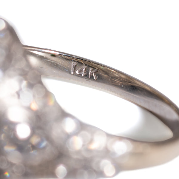Macro close-up of original 14K gold hallmark stamp inside the ring band