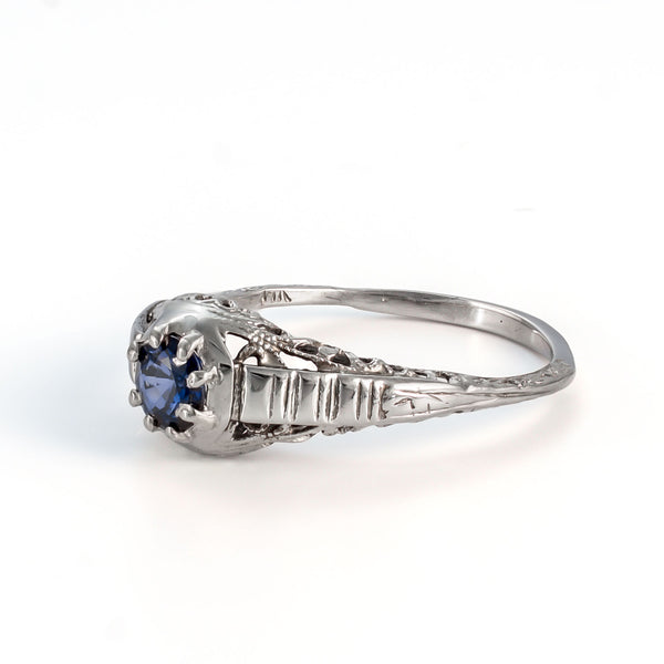 Right side view of vintage sapphire ring with architectural Art Deco styling
