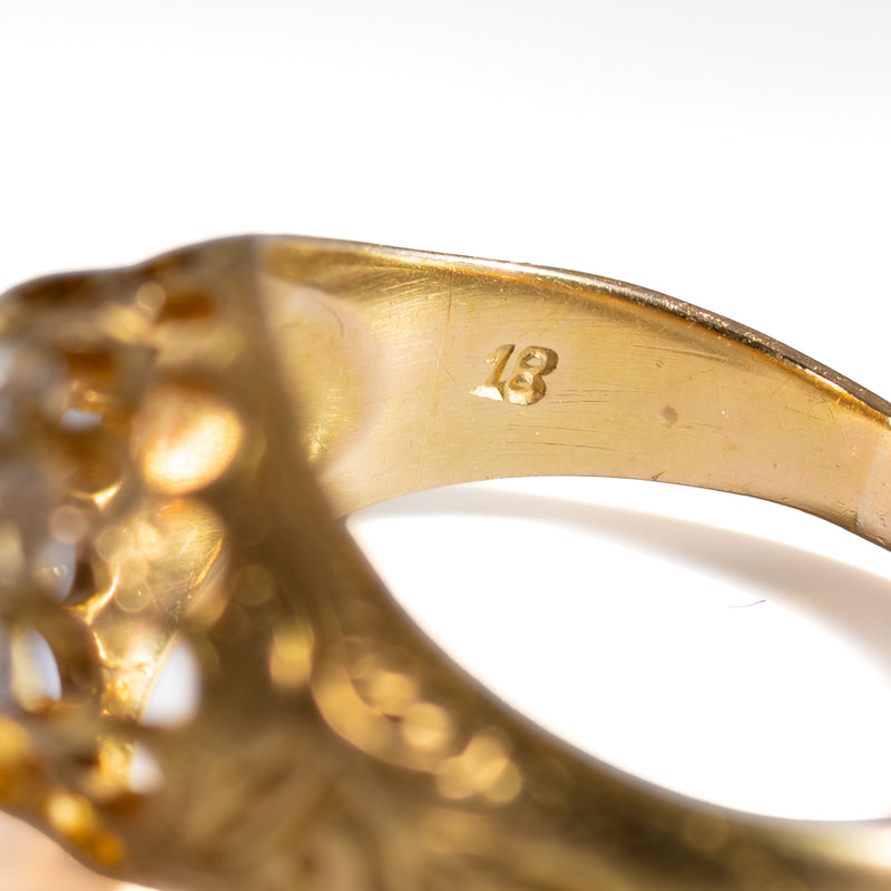 Hallmark stamped 18 on the interior of an authentic Victorian 18K yellow gold diamond cluster ring.