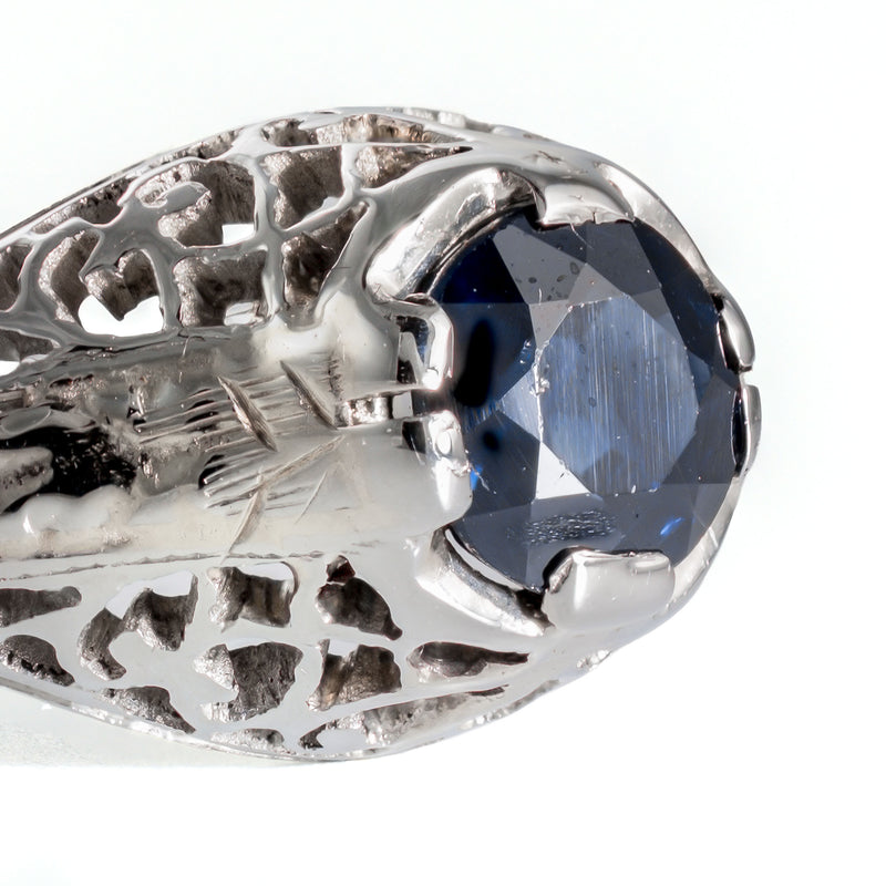 Side profile highlighting the intricate openwork and engraved wheat-leaf patterns on the white gold shoulders.