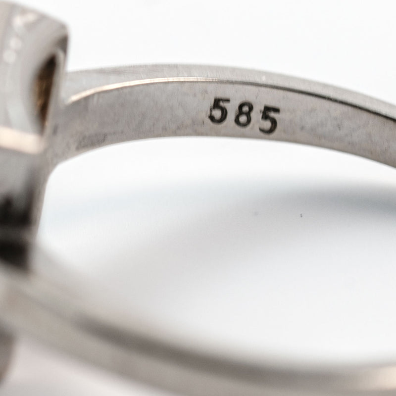585 hallmark on a circa 1935 Art Deco Old European cut diamond ring in 14K white gold