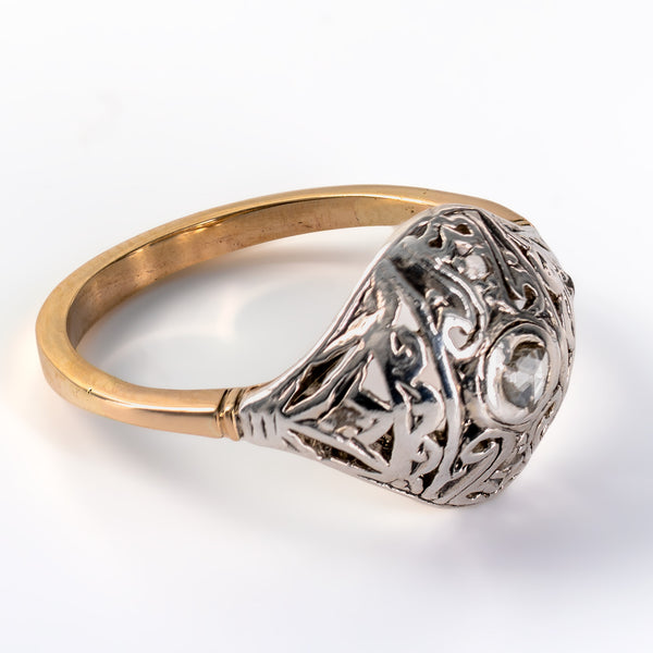 Angled macro view of antique Edwardian ring showing openwork silver gallery and restored 14K yellow gold shank