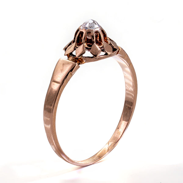 Three-quarter view highlighting the elegant profile and architectural craftsmanship of this Early Victorian French ring