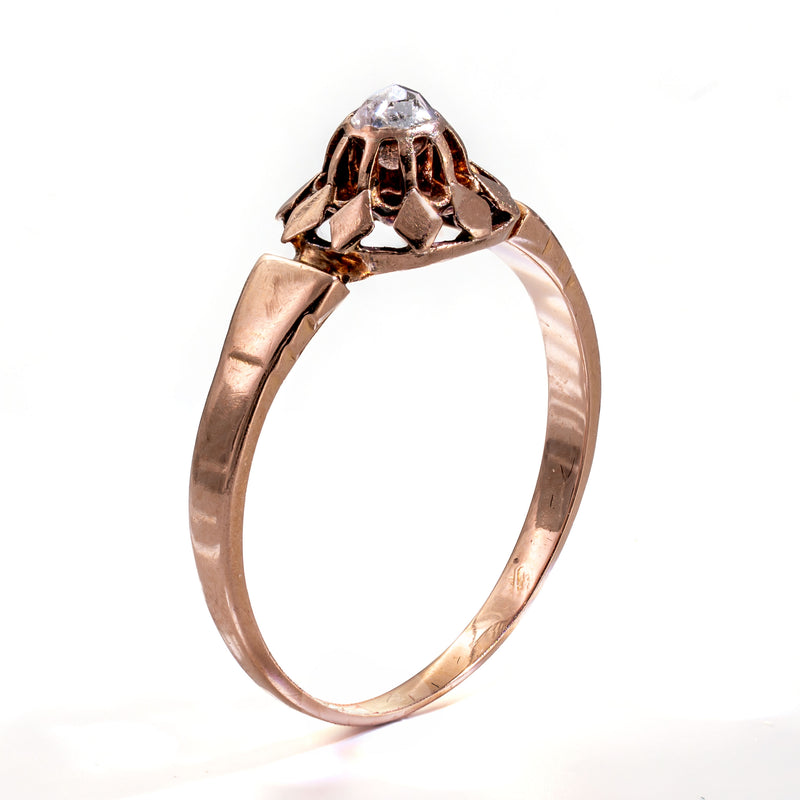Three-quarter view highlighting the elegant profile and architectural craftsmanship of this Early Victorian French ring