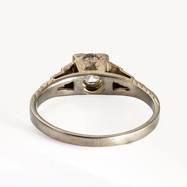 Rear view highlighting the pierced openwork gallery beneath the Old European Cut diamond in an antique Art Deco Cummins-Kremer (CKO)