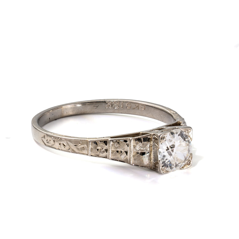 Left side profile showing the engraved shoulders and architectural design of an antique Art Deco Cummins-Kremer (CKO) Old European Cut diamond ring.