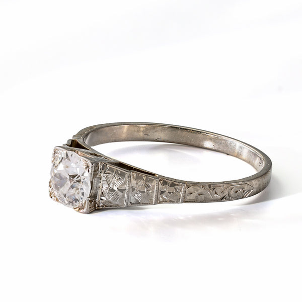 Right side profile showing the hand engraving and pierced gallery of an antique Art Deco Cummins-Kremer (CKO) Old European Cut diamond ring.