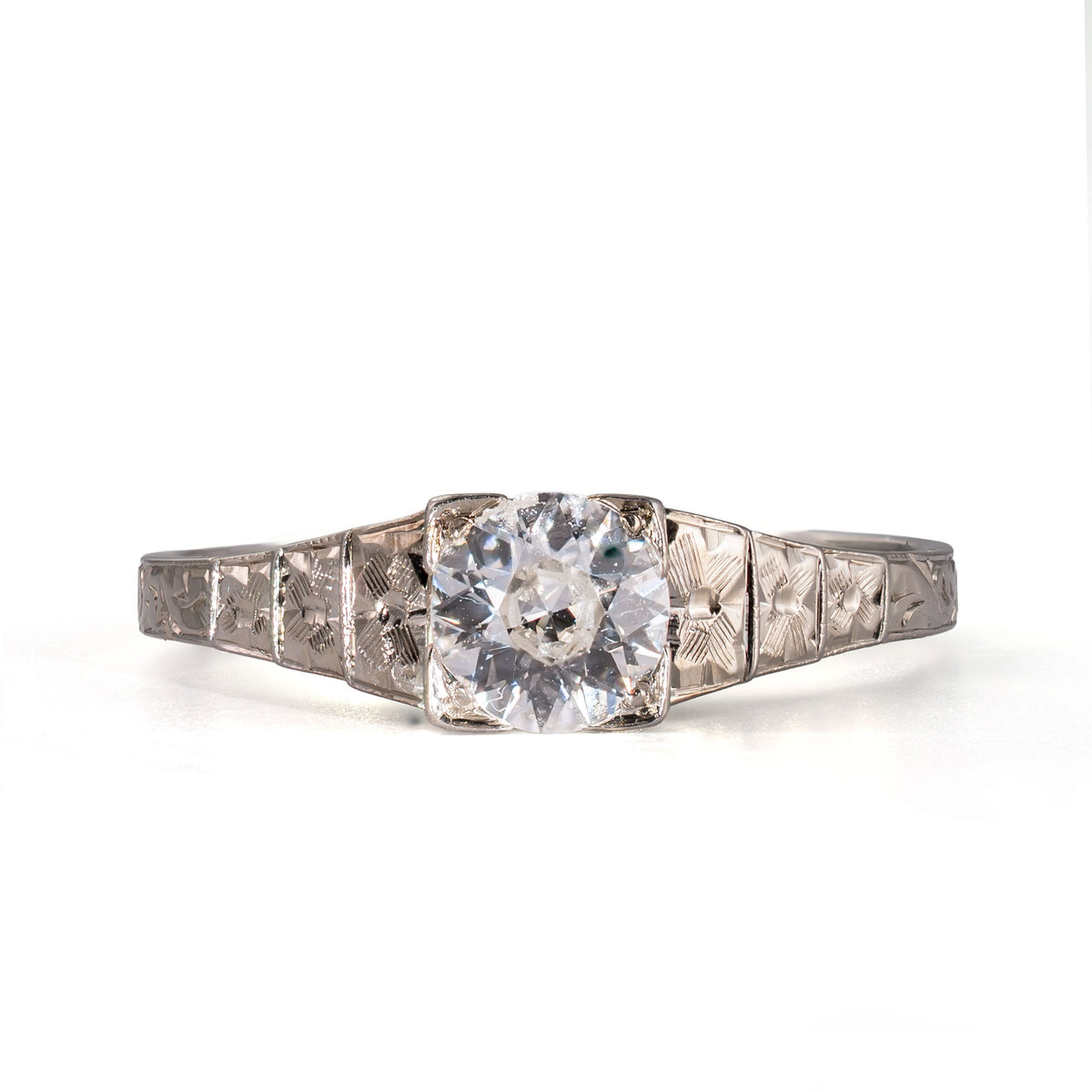 Straight-on view of an antique Art Deco Cummins-Kremer (CKO) Old European Cut diamond ring in 18K white gold.