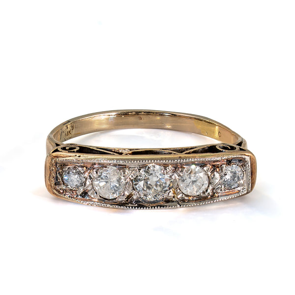 Elevated front view of an antique five-stone diamond ring with approximately 0.65–0.70 carat total weight