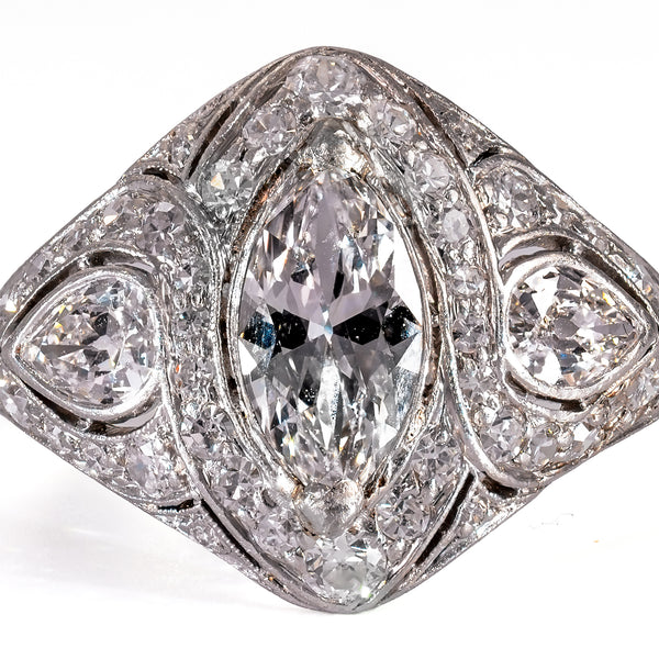 Close-up view of antique marquise center diamond and matched old-cut side pears
