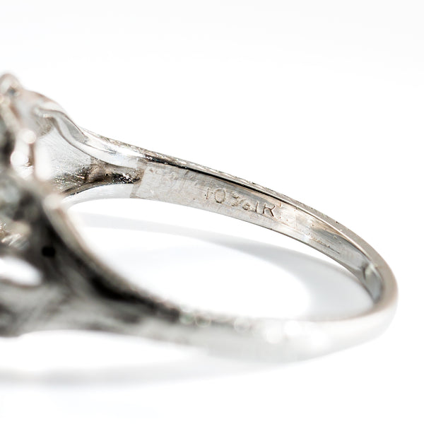 IR Hallmark
Partially legible 10% IR platinum hallmark inside antique diamond ring shank