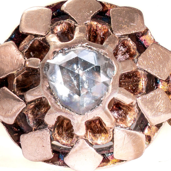 Macro photograph of the original hand-fashioned rose cut diamond showing its unique nineteenth-century faceting