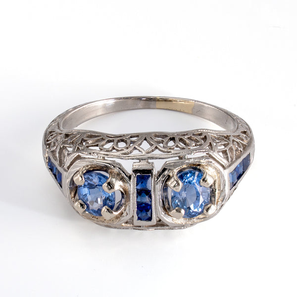Upright view showcasing the elegant architecture and elevated setting of an antique sapphire ring.