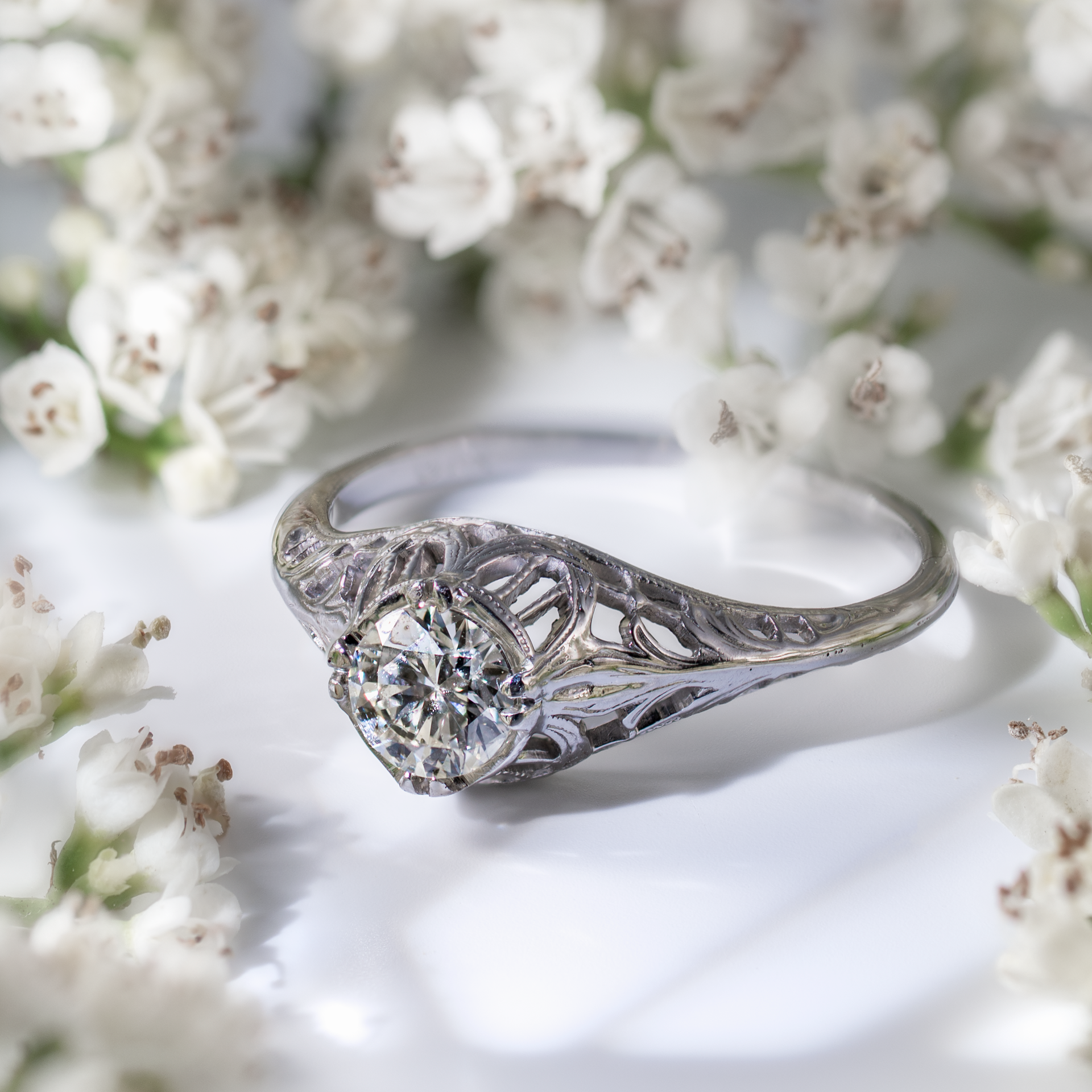 Vintage Art Deco diamond ring featuring an Old European Cut diamond in 18K white gold