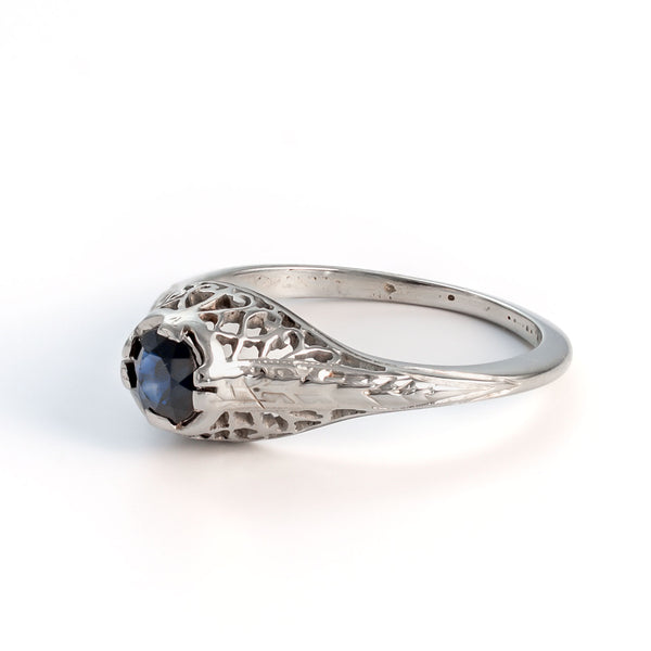 Right side view showing the geometric dash-and-chevron pattern on the white gold