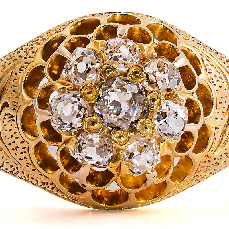 close up featuring the setting of a victorian ring with 8 mine cut diamonds