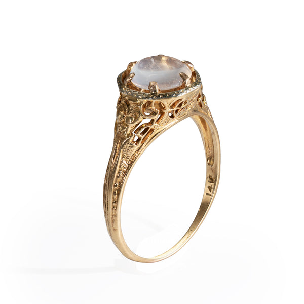 Angled view highlighting the elegant proportions of this early twentieth-century moonstone ring