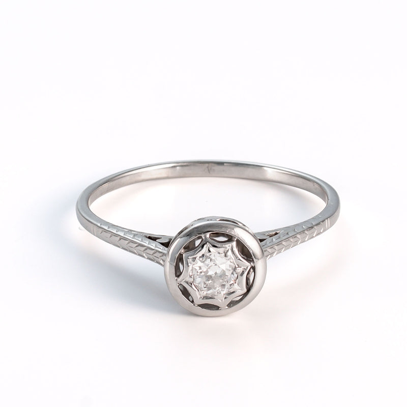 High-angle view showcasing the height of the ornate setting and the delicate proportions of the 14k white gold shank.