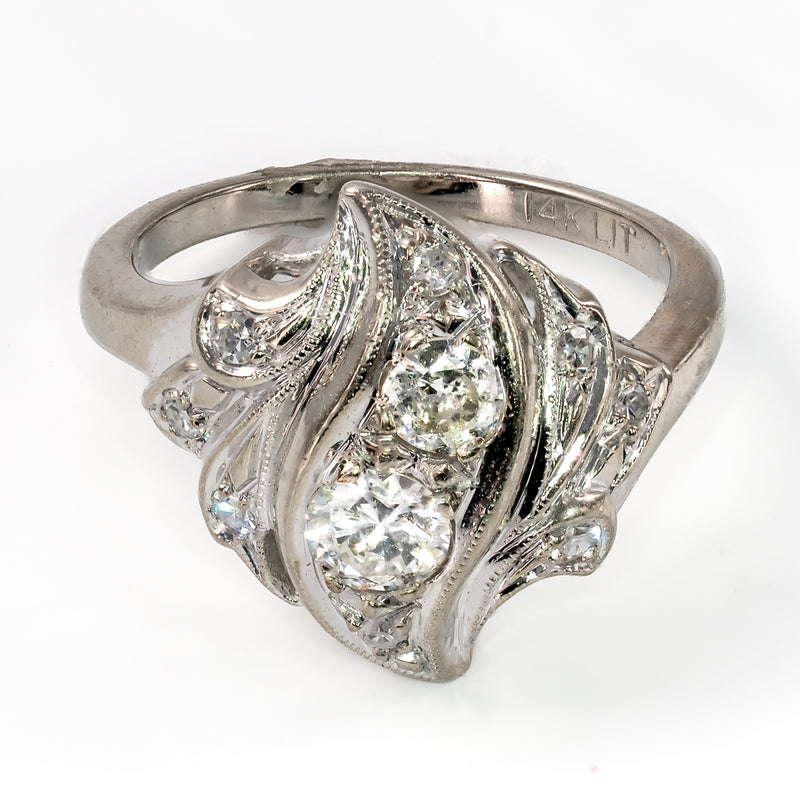front-elevated-view-retro-two-stone-diamond-bypass-ring-milgrain-detailing