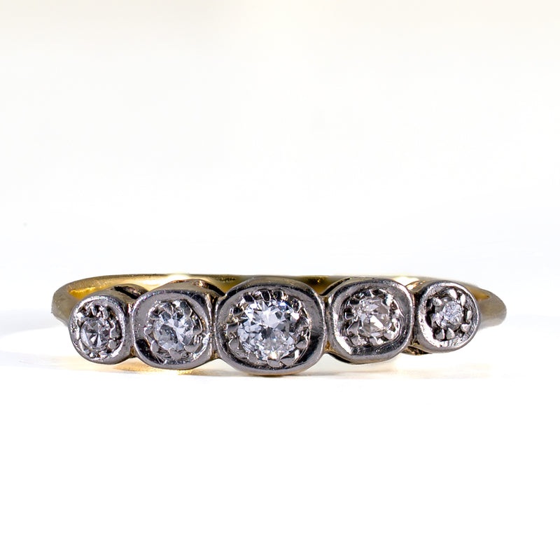 Front view of Edwardian 5-stone OEC diamond band in platinum illusion box settings on a white background.