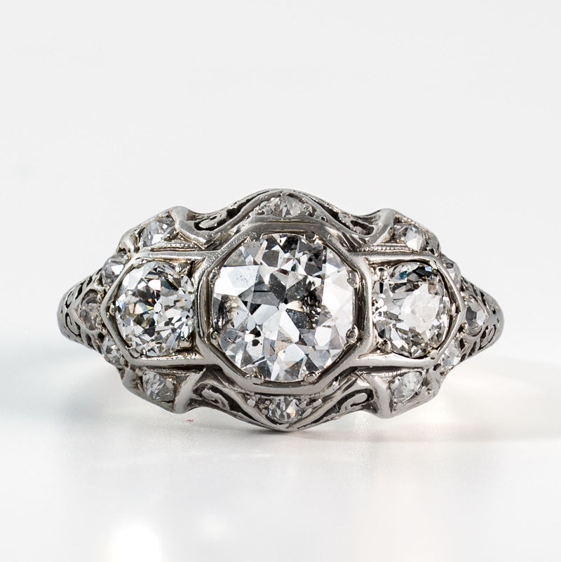 Front-facing view of an antique Art Deco diamond ring set with approximately 2 carats total weight of Old European Cut diamonds