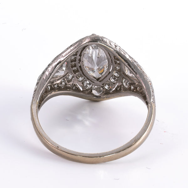Underside view showing fine pierced lace filigree undergallery and open wirework