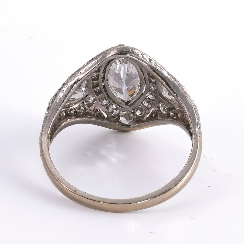 Underside view showing fine pierced lace filigree undergallery and open wirework