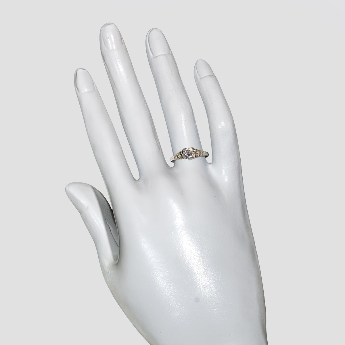 Hand Shot of Vintage CKO diamond and white gold ring