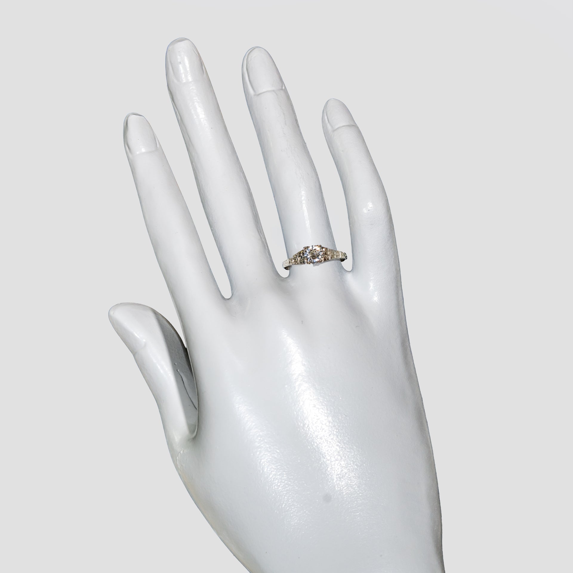 Hand Shot of Vintage CKO diamond and white gold ring