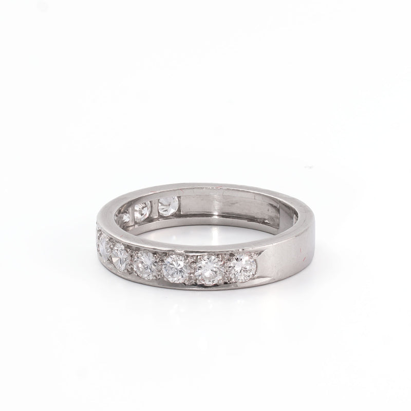 Angled view of a platinum eternity-style ring with luminous natural diamonds