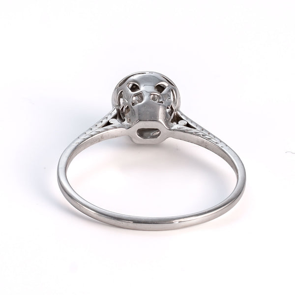 View of the interior band and the back of the setting, showing the authentic vintage construction and polished finish.