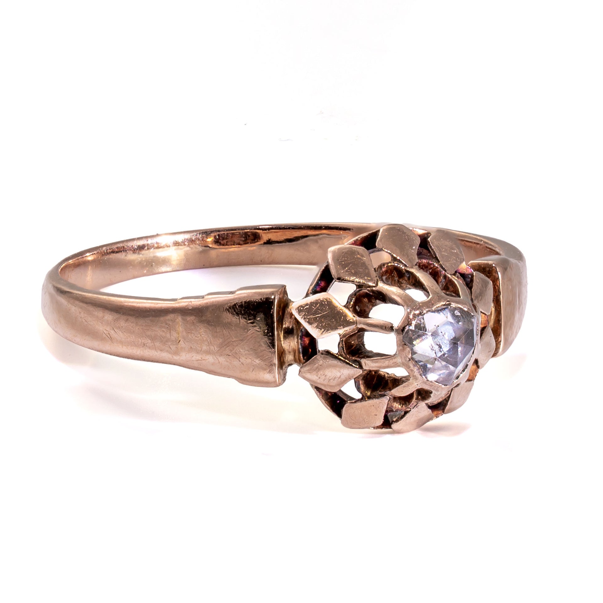 Side profile highlighting the hand-pierced gallery and sculpted antique buttercup setting