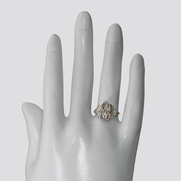 circa 1940s Litwin and Sons Multi Diamond Bypass Ring in 14k on the hand

