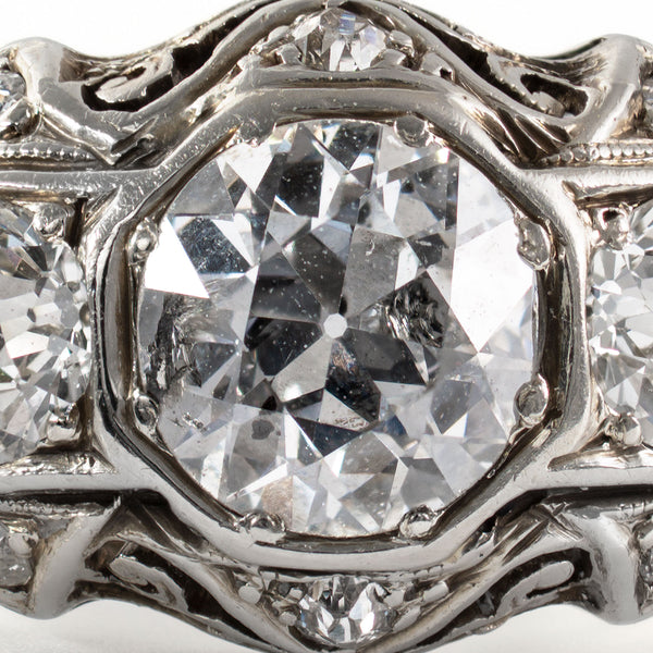 Close-up of antique Old European Cut diamonds displaying high crowns, open culets, and period faceting