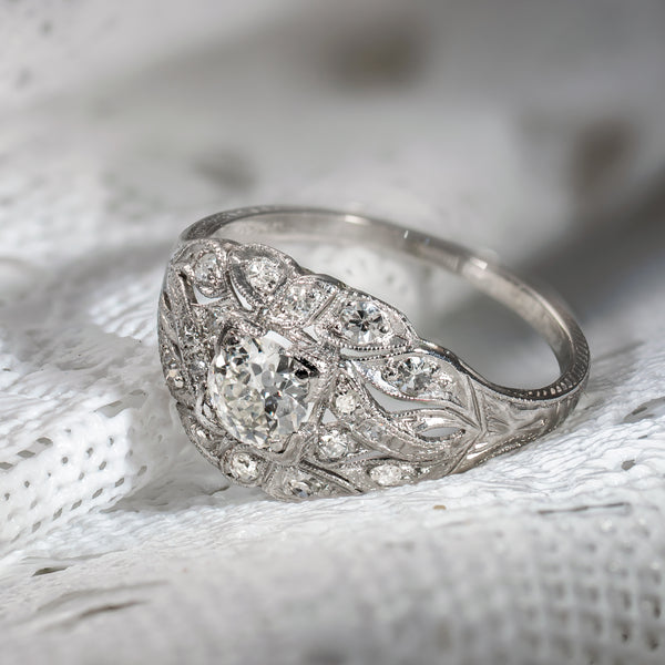 Antique platinum diamond ring with Old European Cut center diamond and openwork setting