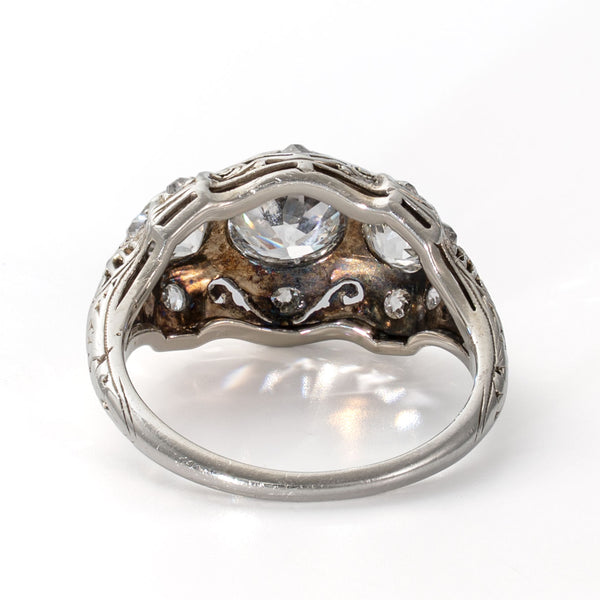 Rear gallery view highlighting the pierced openwork construction of an antique 19K white gold ring