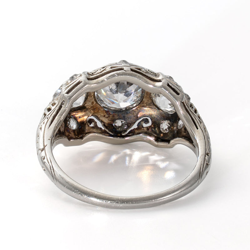 Rear gallery view highlighting the pierced openwork construction of an antique 19K white gold ring