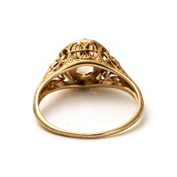 Rear view revealing the open gallery construction of the vintage gold ring