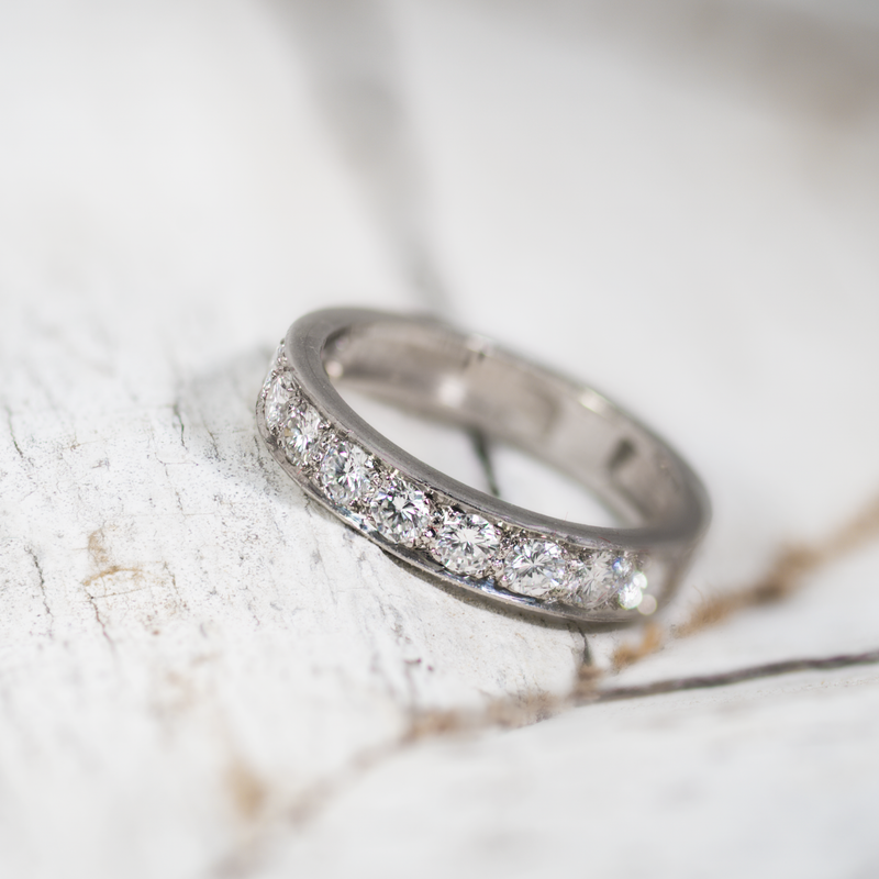 Platinum band featuring eleven bright natural diamonds with elegant low-profile design