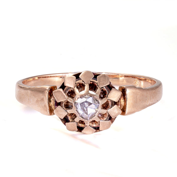 Elevated front view of an Early Victorian French rose cut diamond ring showcasing its closed-back buttercup gallery
