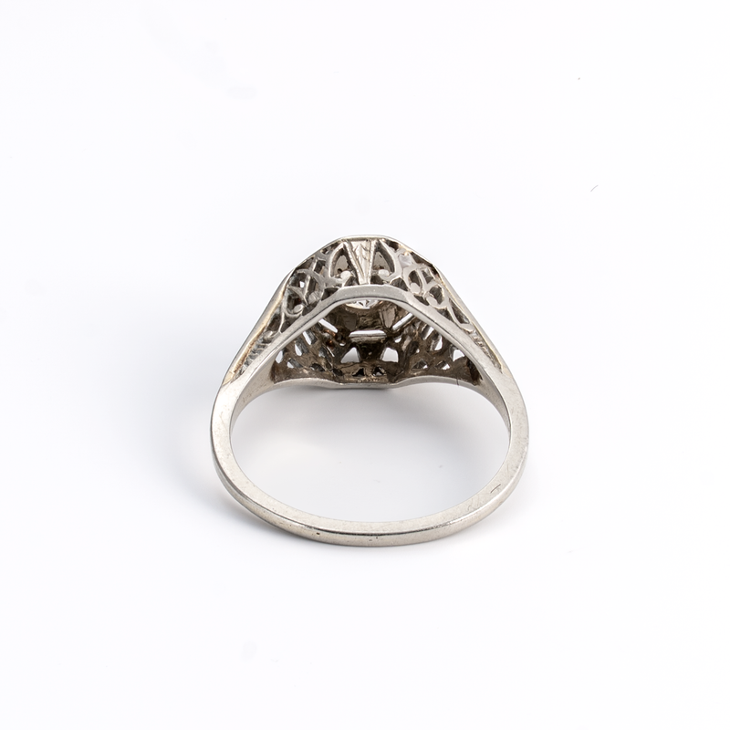 White Gold ring with intricate design on a white background