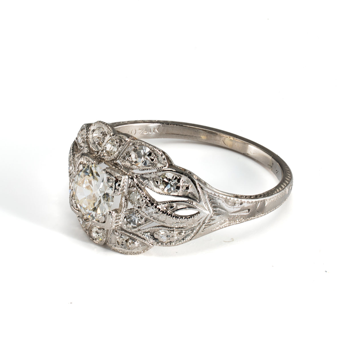 Platinum ring with OEC Center and 16 accents in a dome shaped ring