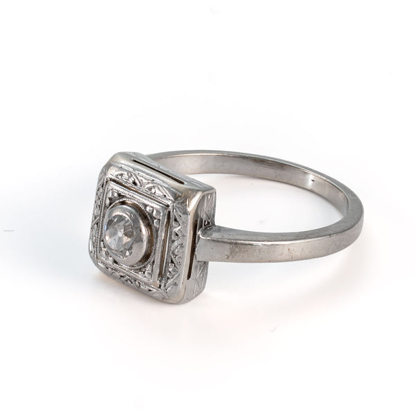 Left side profile of a circa late 30's Art Deco shield form Old European cut diamond ring