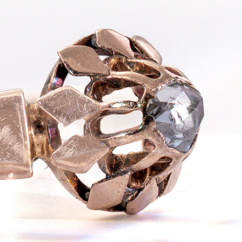 Close-up side detail of the antique rose cut diamond and early Victorian buttercup mounting