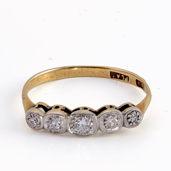 Antique Edwardian 0.15ctw Old European Cut diamond 5-stone ring on white silk background, showing platinum illusion settings and 18ct yellow gold band.