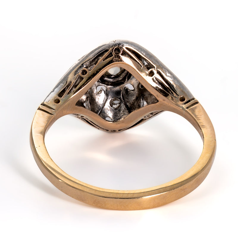 Underneath view of ring gallery showing open diamond pavilion pierced backs and clean 14K yellow gold shank replacement