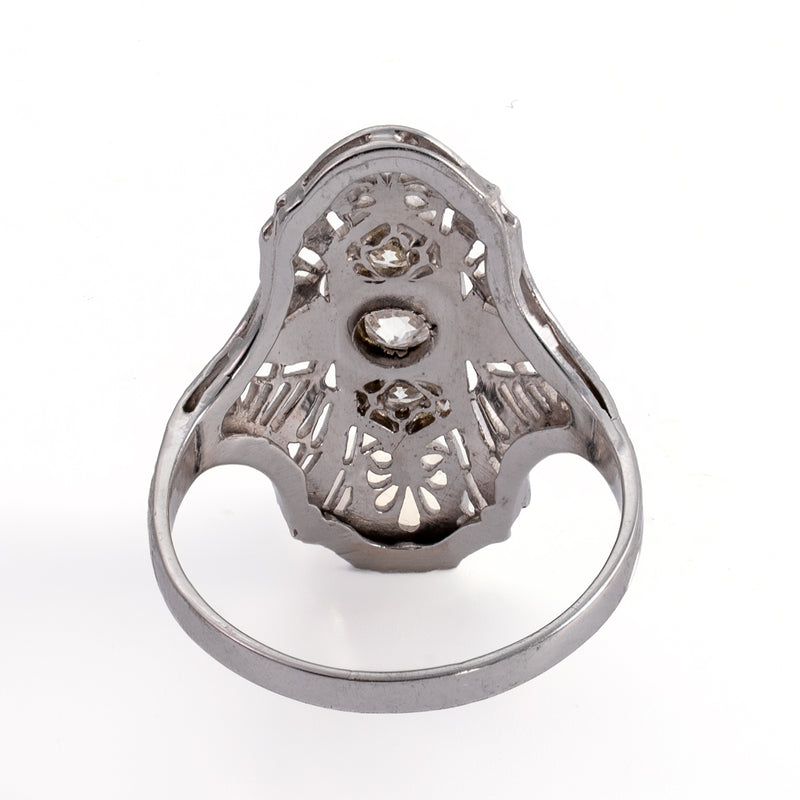 Reverse underside view showing openwork metal structure and diamond light ports.