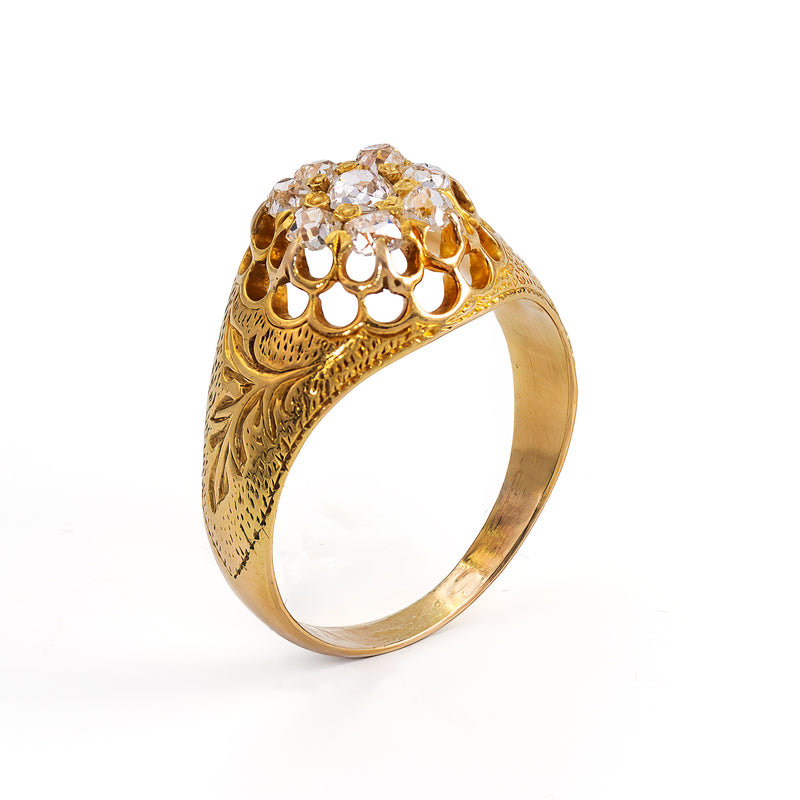 upright side view showing the engraving and pierced gallery of a late Victorian era diamond ring