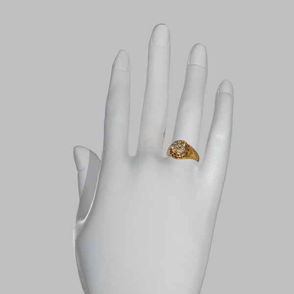 Victorian Old Mine Cut diamond cluster ring shown on the finger demonstrating its remarkable finger presence and elegant proportions.